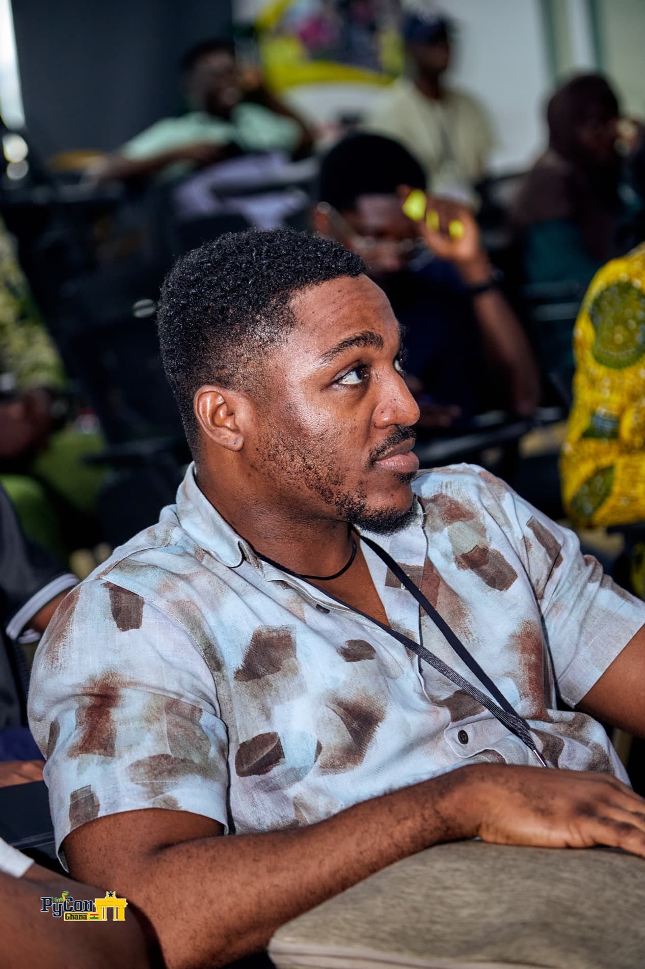 Attendee listening during the PyCon Ghana 2026 session