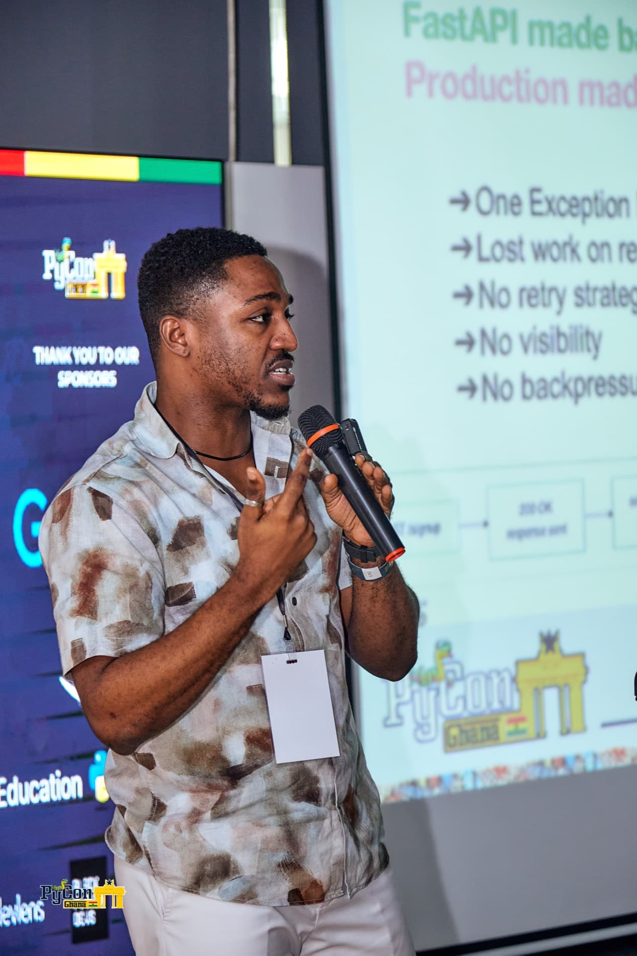 Richard Quaicoe presenting the failure modes of FastAPI BackgroundTasks at PyCon Ghana 2026